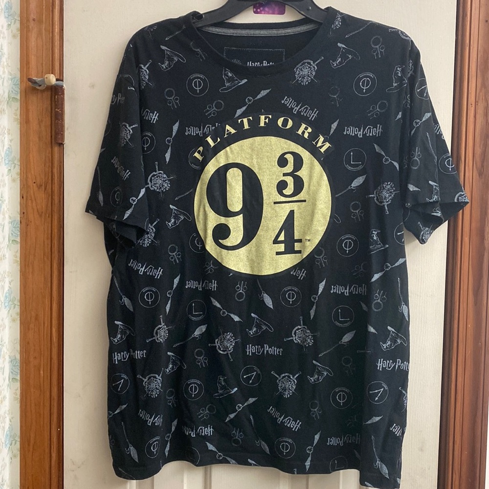Youth Large Harry Potter Tee-Shirt color Black worn print in good condition.